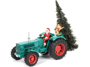 Markeplace : Tracteur HANOMAG conduit par le Père Noël transportant un sapin  - SCHUCO - 1:32